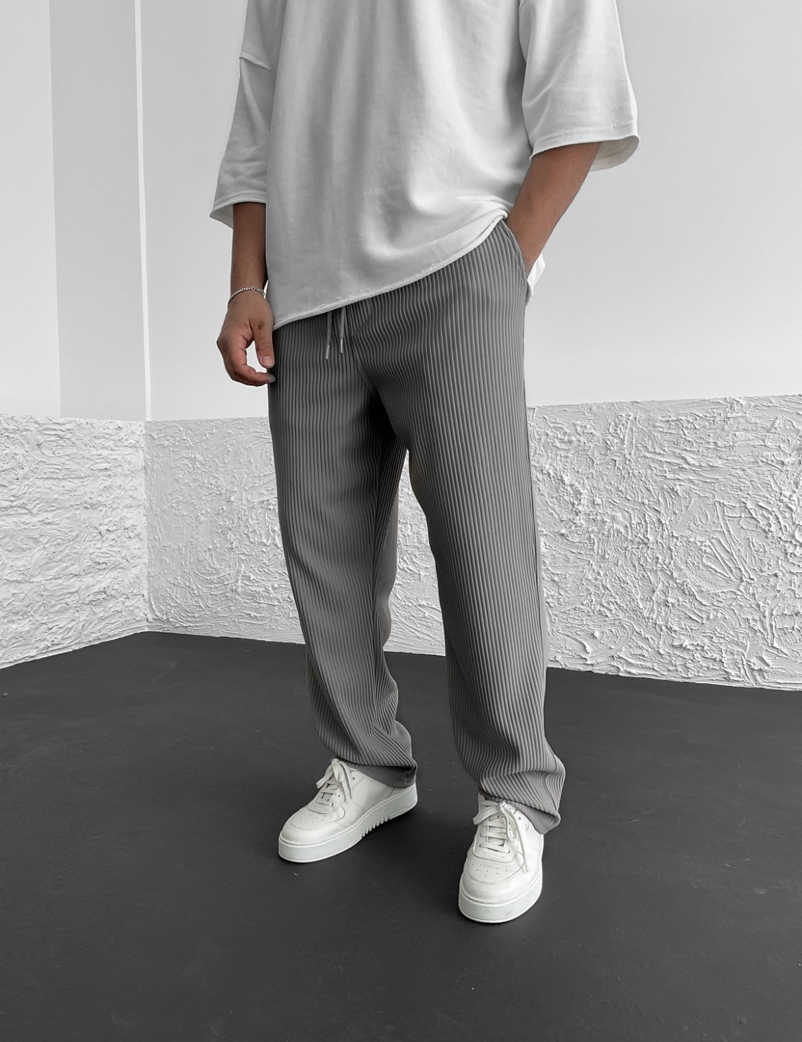 Pantalones ajustados elásticos para hombre