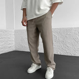 Pantalones ajustados elásticos para hombre