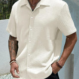 Camisa de hombre de color sólido con botones y solapa de manga corta