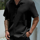 Camisa de hombre de color sólido con botones y solapa de manga corta