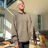 Sudadera con capucha de leopardo elegante