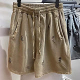 Shorts vintage desgarrados