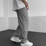 Pantalones ajustados elásticos para hombre