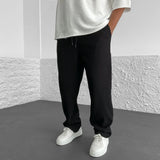 Pantalones ajustados elásticos para hombre