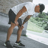 Pantalones cortos para correr de secado rápido 2 en 1 para hombre con bolsillo para teléfono