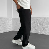Pantalones ajustados elásticos para hombre