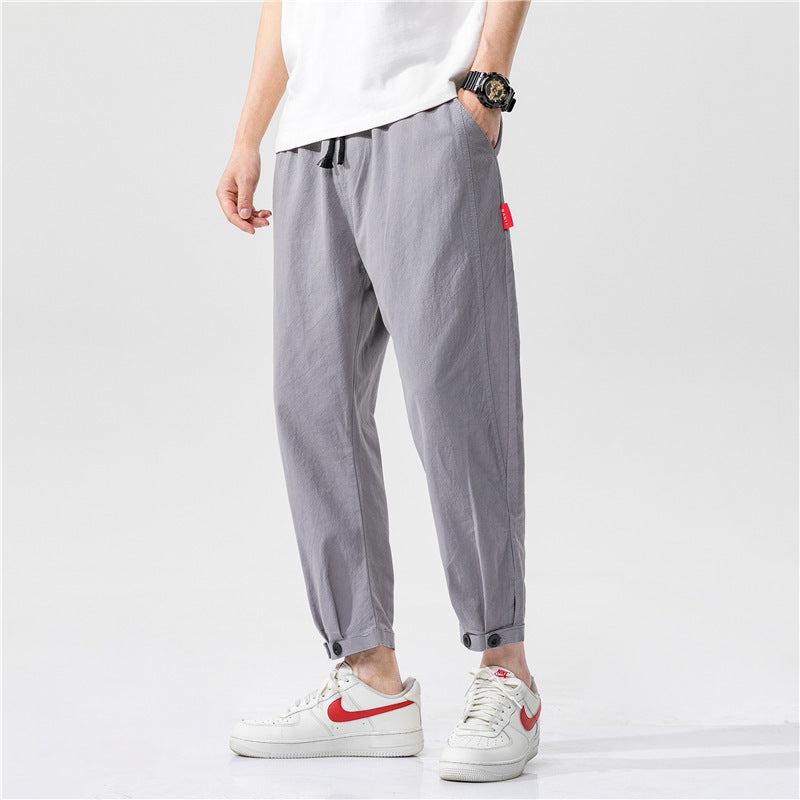 Pantalones ajustados de corte relajado Theo Navarro