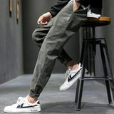 Pantalones ajustados elásticos para hombre