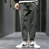 Pantalones ajustados elásticos para hombre