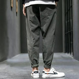 Pantalones ajustados elásticos para hombre