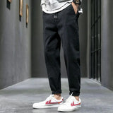 Pantalones ajustados elásticos para hombre